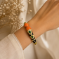 Riwaayat Coral & Emerald Enamel Statement Bracelet