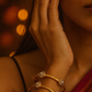 Elegant Gold Textured Bangles with Diamond Accents
