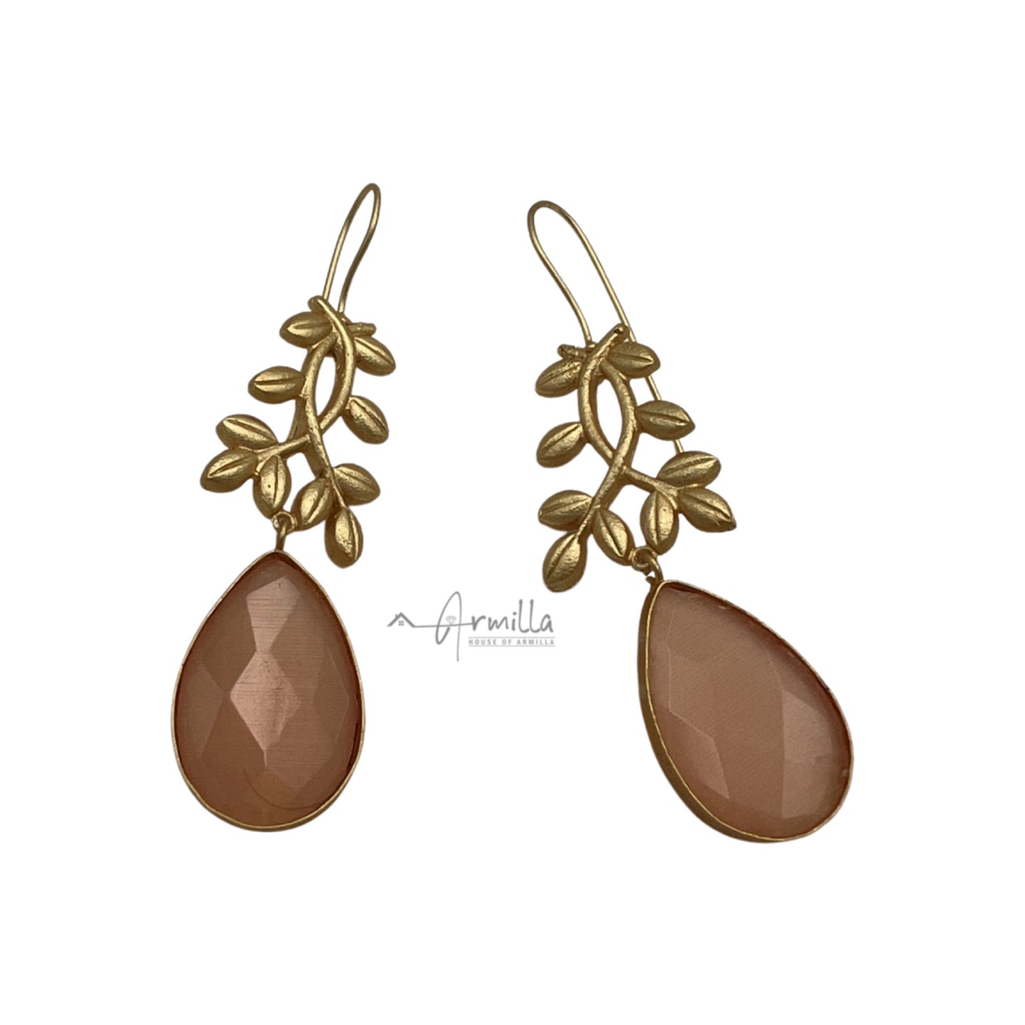Light Orange Stone In Tear Drop Design with a Beautiful Gold Leaf Carved On The Top